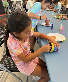 Girl at craft table